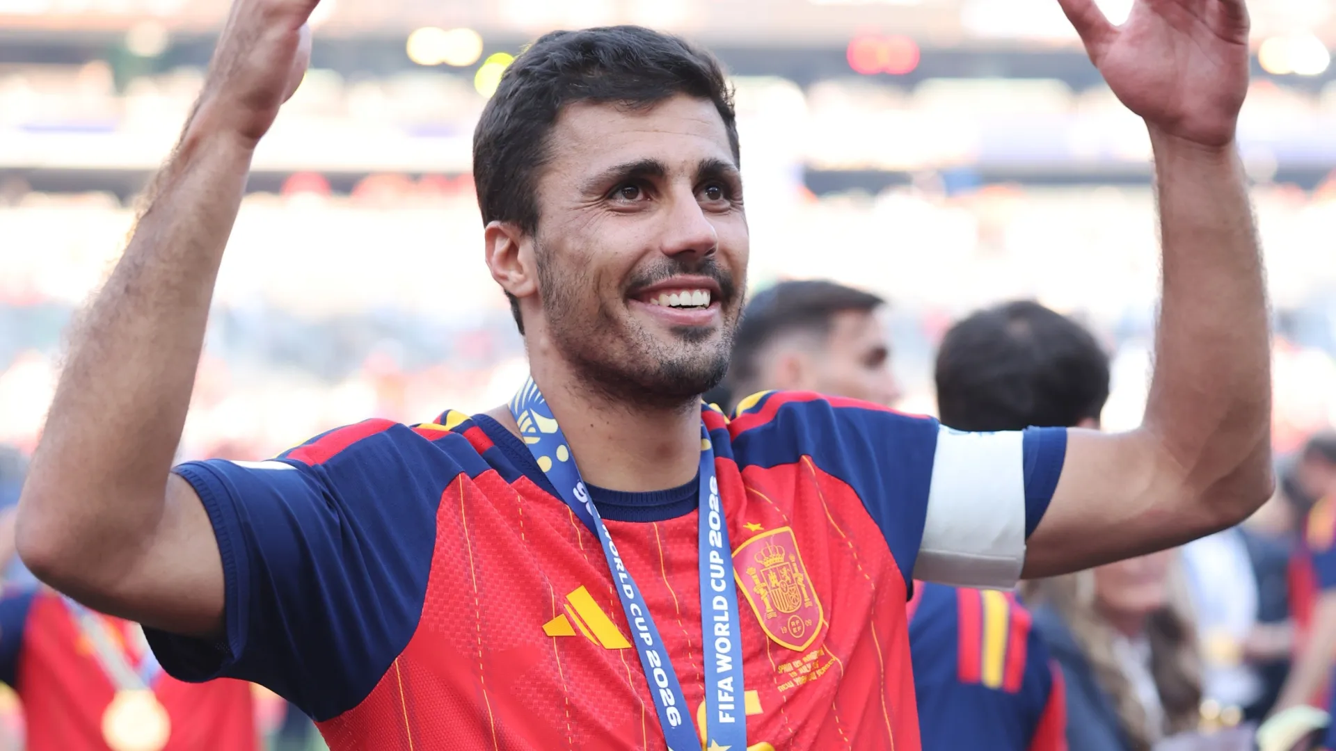 Rodri #16 of Spain celebrates with his medal after the team