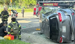 ICE agents in Milwaukee pause arrest to rescue rollover crash victim