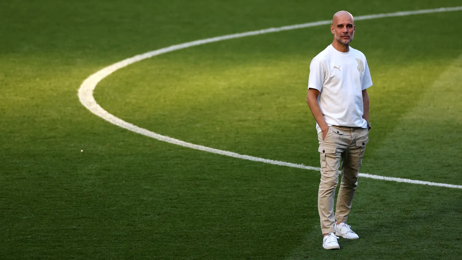 Pep Guardiola, Manager of Manchester City, looks on during his farewell ceremony.
