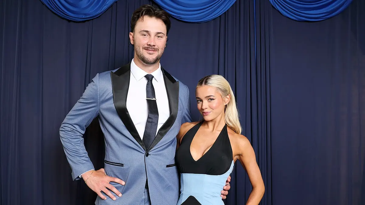 Paul Skenes poses with Olivia Dunne at a red carpet photoshoot in Philadelphia.