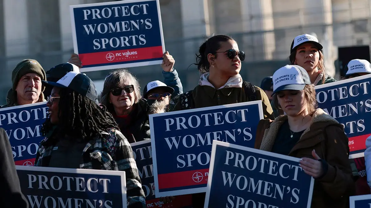 Protesters against transgender athletes competing in women