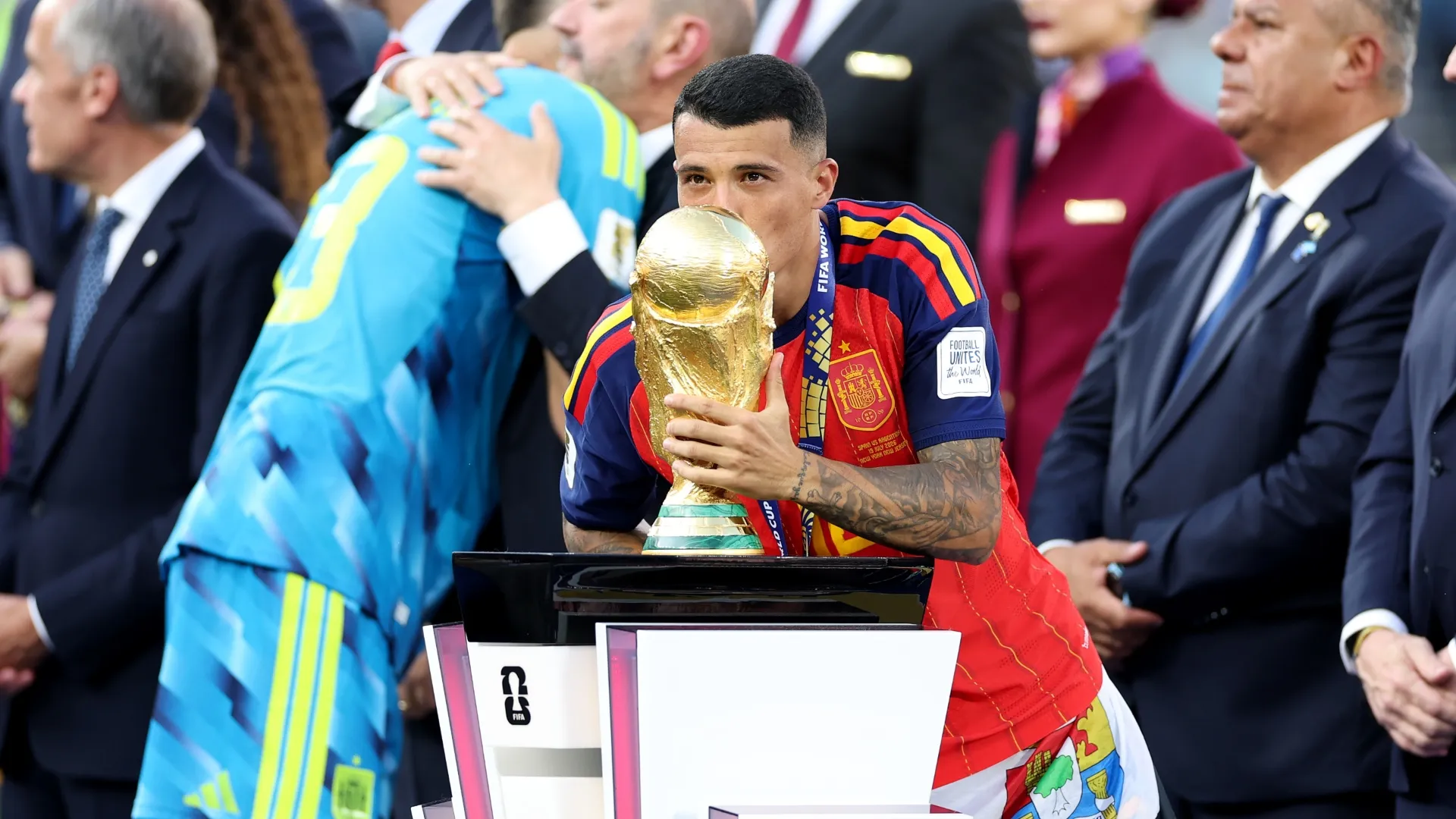 Pedro Porro #12 of Spain kisses the World Cup Winner