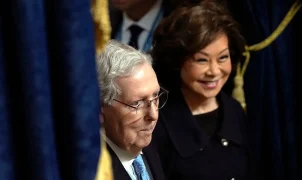 McConnell's wife, Elaine Chao, remained in China during his hospitalization