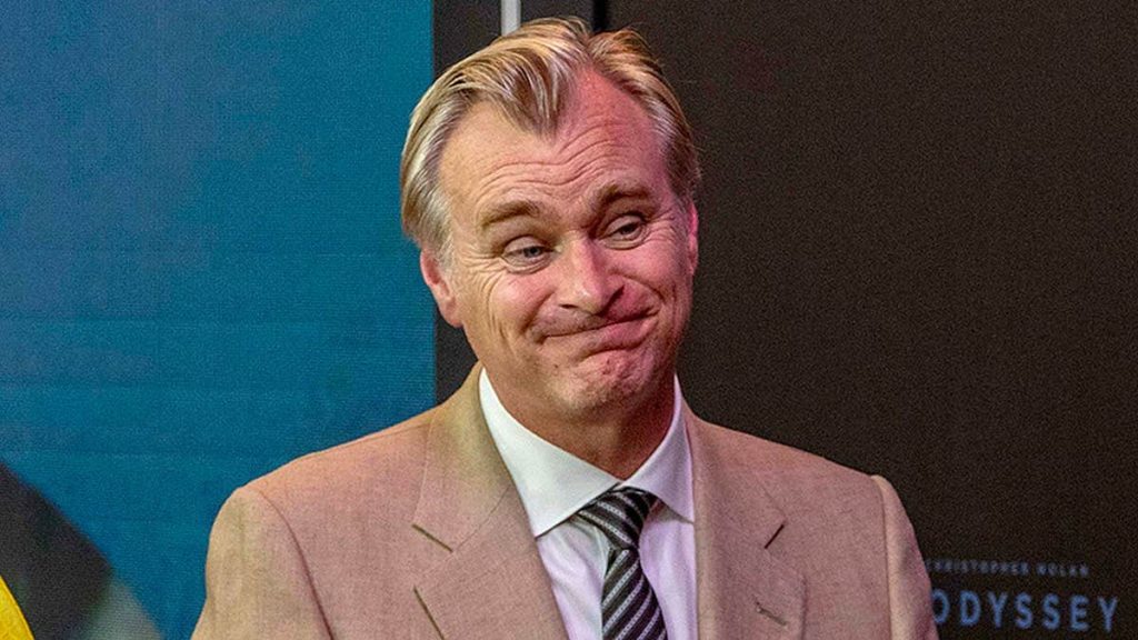 Christopher Nolan is seen on the red carpet of a screening for
