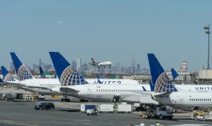 United Airlines passenger says he was forced to change anti-war shirt