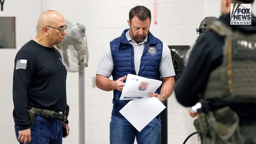 Secretary of Homeland Security Markwayne Mullin receiving briefing at ICE facility in Manassas Virginia