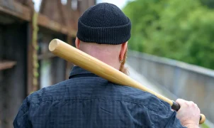 If you're knocking out DoorDash drivers with a baseball bat after they honk at you, police would like a word