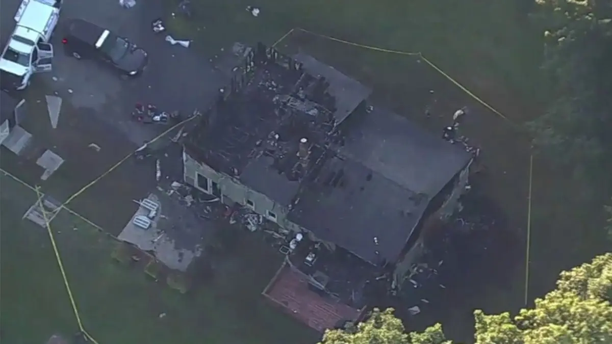 image shows aerial view of burned home
