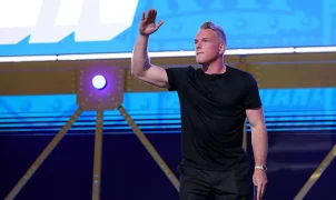 Pat McAfee threatens to sue liberal troll who accused him of using 'N-word' after sitting with Trump
