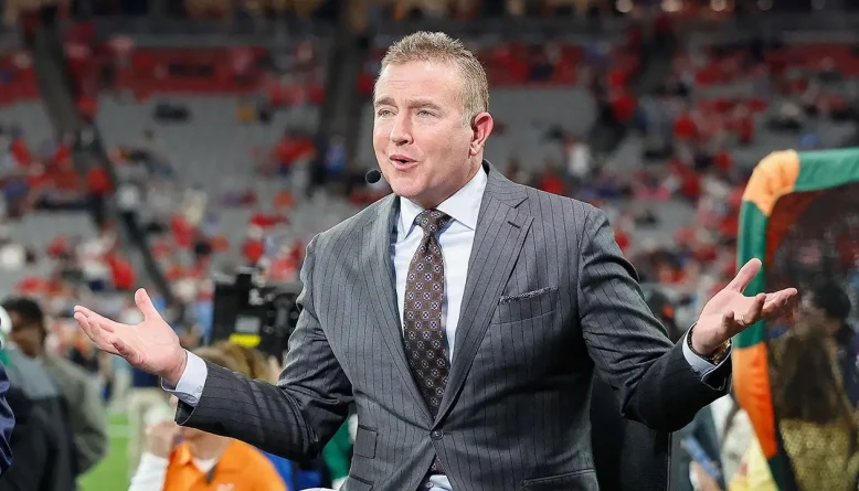 Kirk Herbstreit and his former gymnast wife have four boys thanks to handstands on the bed