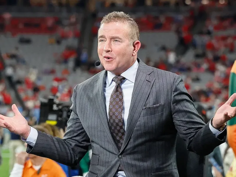 Kirk Herbstreit and his former gymnast wife have four boys thanks to handstands on the bed