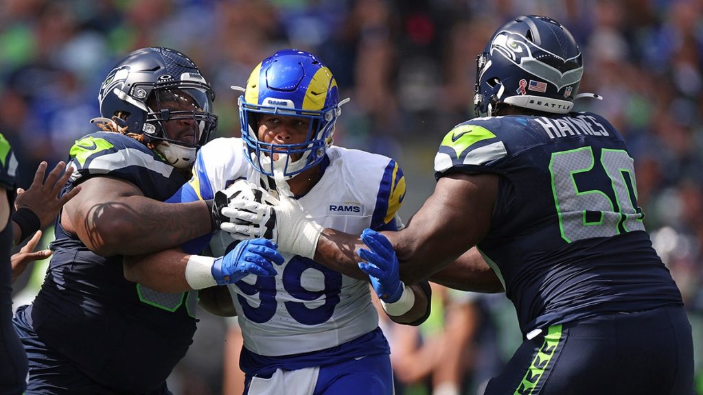 ‘We back’: Aaron Donald returns to the Rams and a defense now loaded with Myles Garrett and others