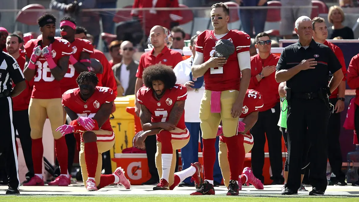 Colin Kaepernick kneels for the national anthem before a game at Levi