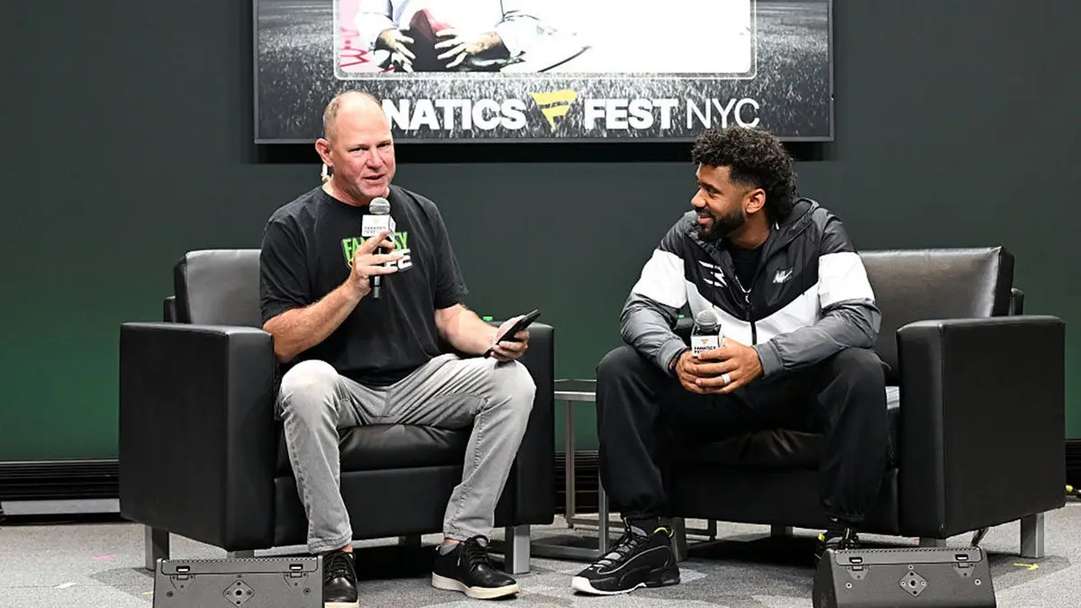 Matthew Berry and Russell Wilson speak onstage at Fanatics Fest NYC.