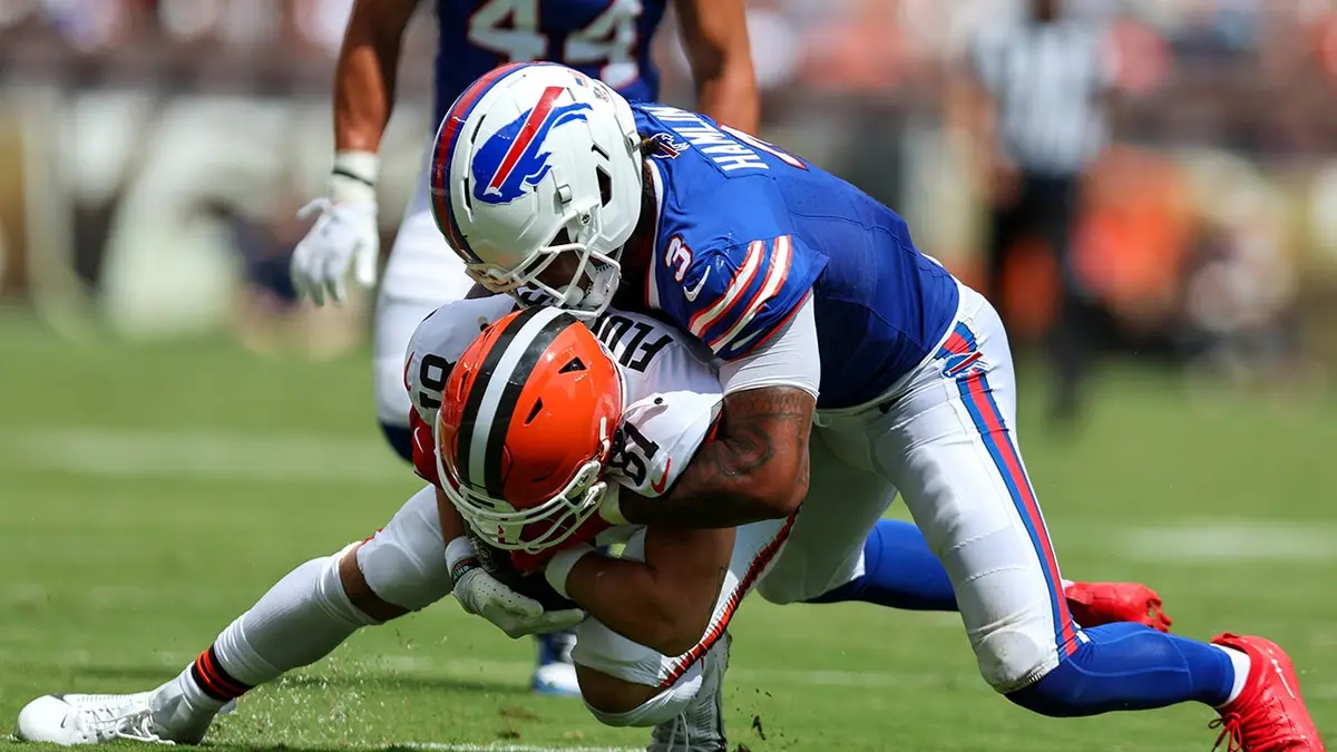 Damar Hamlin tackles Luke Floriea during a preseason game.