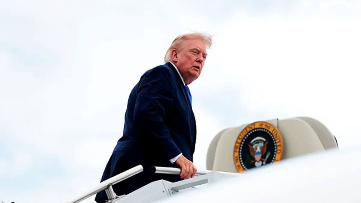 President Donald Trump boards Air Force One at Morristown Municipal Airport on August 2, 2026.