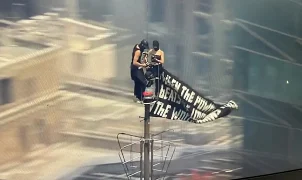 Empire State Building couple kiss outside court after burglary charges