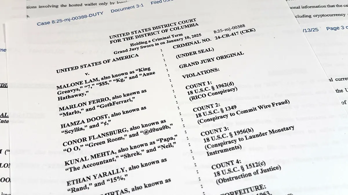 A Justice Department indictment document against Malone Lam is photographed.