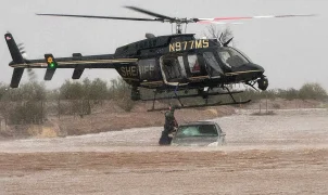 Arizona sheriff's helicopter rescue saves 2 people in flooded car