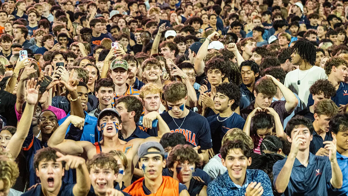 Fans in Virginia storm the field after overtime win over Florida State of an NCAA college football game, Friday, Sept. 26 2025, in Charlottesville, Virginia.