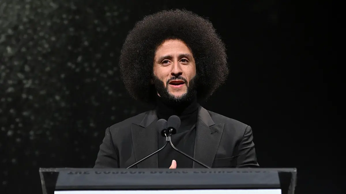 Colin Kaepernick speaks onstage during an awards dinner in New York City.