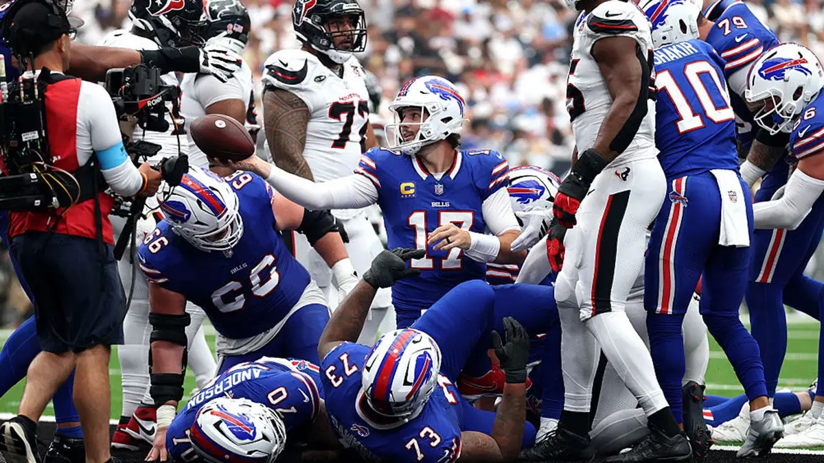Josh Allen reacts after scoring a rushing touchdown against the Houston Texans.
