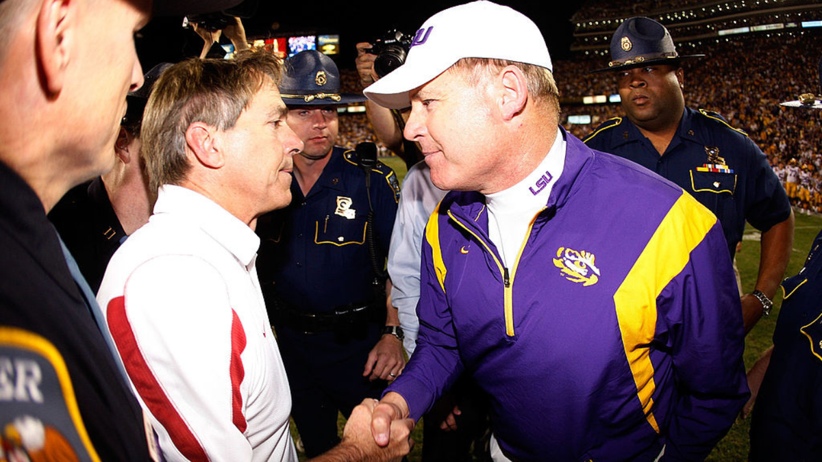 Nick Saban is congratulated by Les Miles after Alabama defeats LSU in overtime.