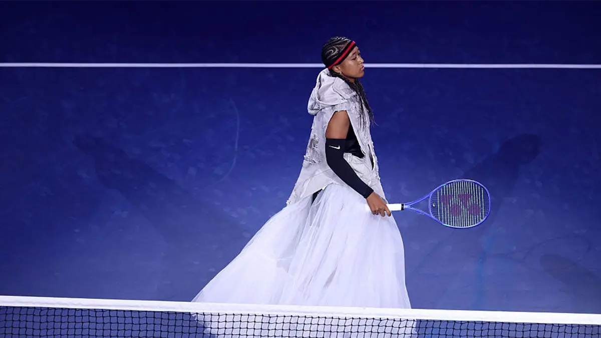 Naomi Osaka of Japan walks onto the court