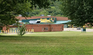 West Virginia principal charged after locker room devices found