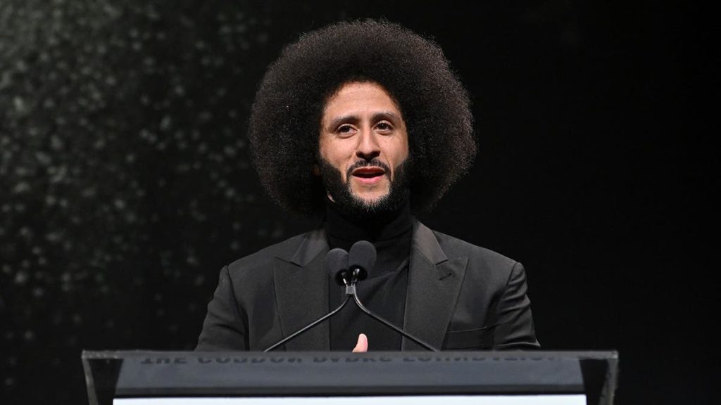 Colin Kaepernick speaks onstage during an awards dinner in New York City.