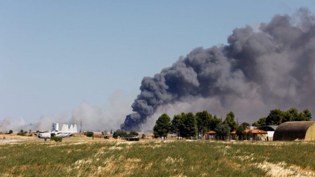 Smoke rises following a Greek F-4 Phantom fighter jet crash in Tanagra, Greece.