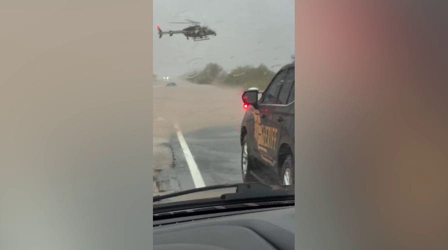 Arizona sheriff deploys helicopter to save 2 people stranded in flooded car during heavy rains