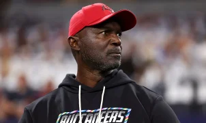 Buccaneers coach Todd Bowles suffers health scare after taking helmet to the stomach during celebration