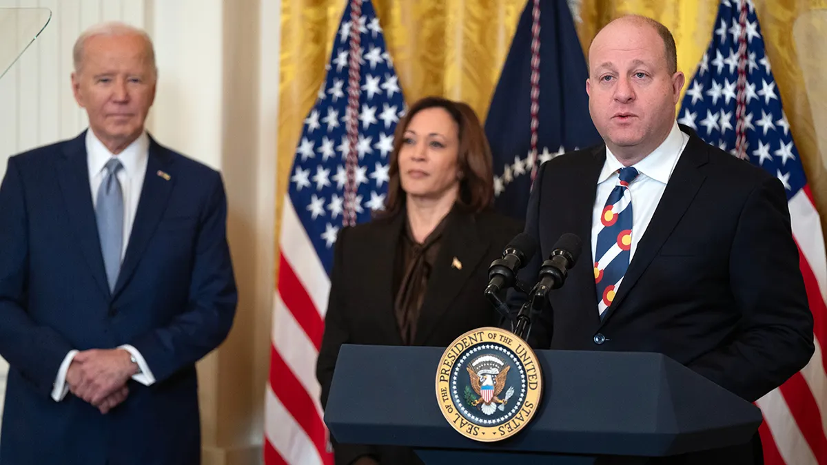 Colorado Gov. Jared Polis, Vice President Kamala Harris and President Joe Biden in 2024