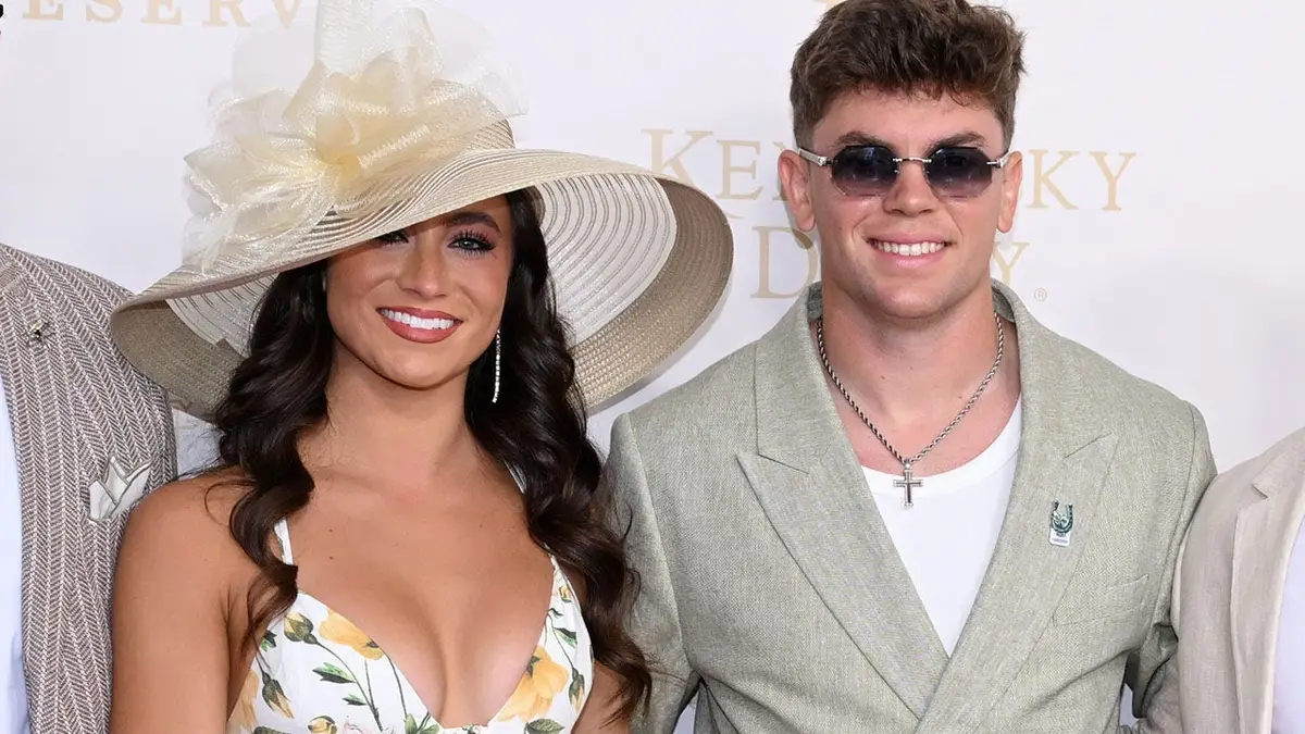 Cooper DeJean at Churchill Downs during the Kentucky Derby with Cowboys cheerleader Abby Summers