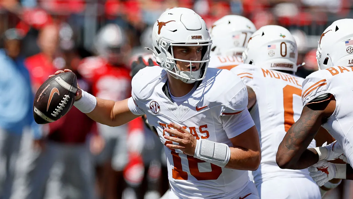 Texas quarterback Arch Manning drops back to pass against Ohio State during the first half of an NCAA college football game, Saturday, Aug. 30, 2025, in Columbus, Ohio.