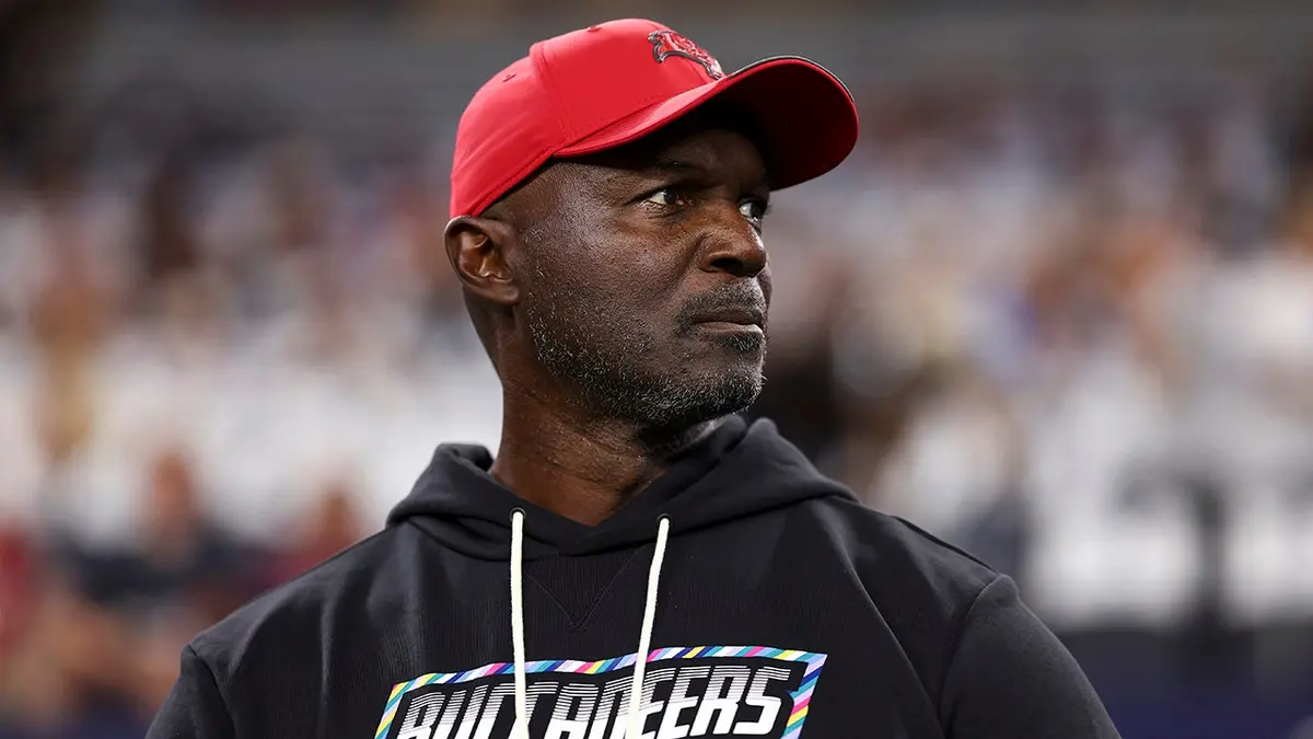 Todd Bowles stands on the sidelines before an NFL game.