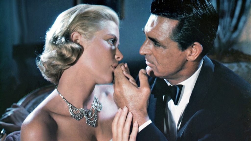 Grace Kelly kissing Gary Grant