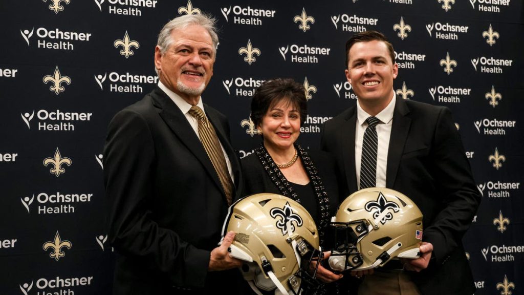 Kellen Moore, Mickey Loomis, and Gayle Benson at a press conference
