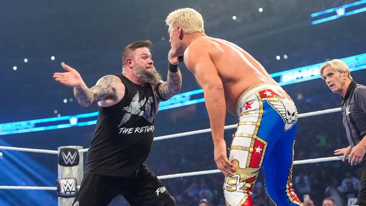 Kevin Owens slaps Cody Rhodes during SmackDown at Ball Arena.