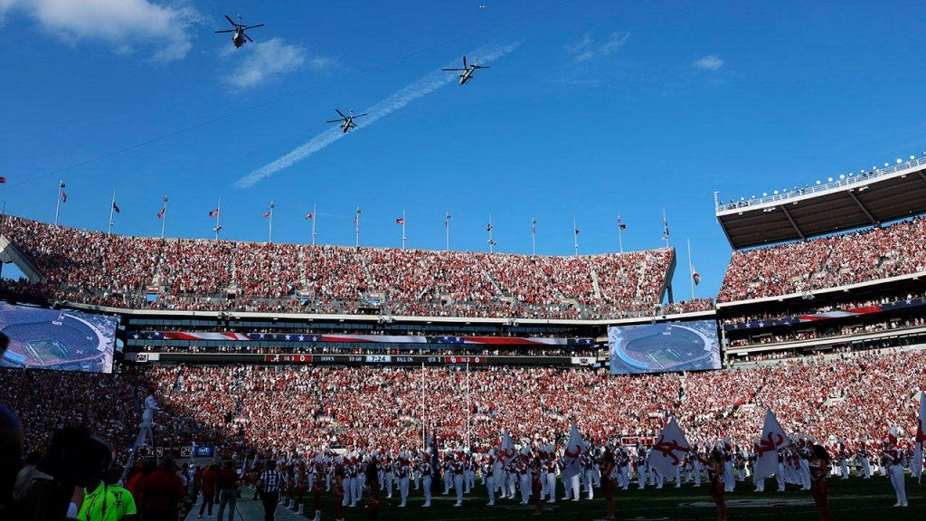 Alabama player ‘determined’ to play after surgery three days ago, while officials plan for Hurricane Isaias
