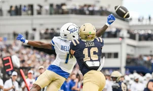 Tulsa's David Wells Jr. tips ball to himself for improbable touchdown in wild play against Navy