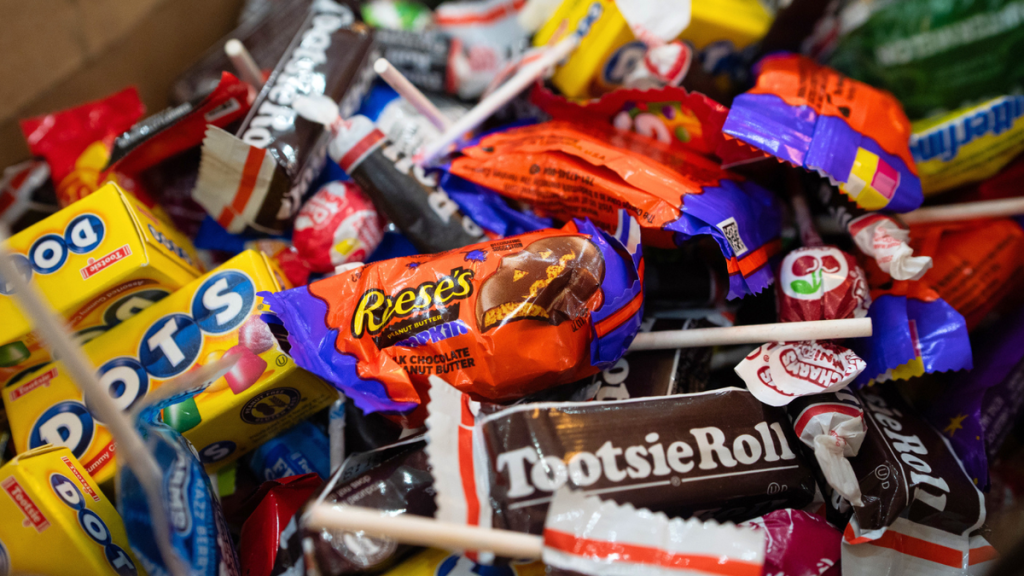 An assortment of Halloween candy is seen.