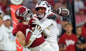 Alabama player ‘determined’ to play after surgery three days ago, while officials plan for Hurricane Isaias