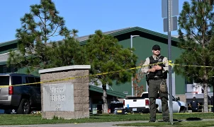 Oregon school shooting stopped by armed bystander amid gun control debate