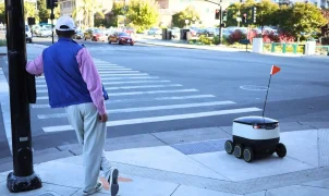 Retired professor arrested in Philadelphia for protesting delivery robot